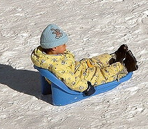 Child on toboggan